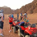 Epic Sunset Desert Adventure: 3 Hour Desert Safari Quad Bike and Camel Ride