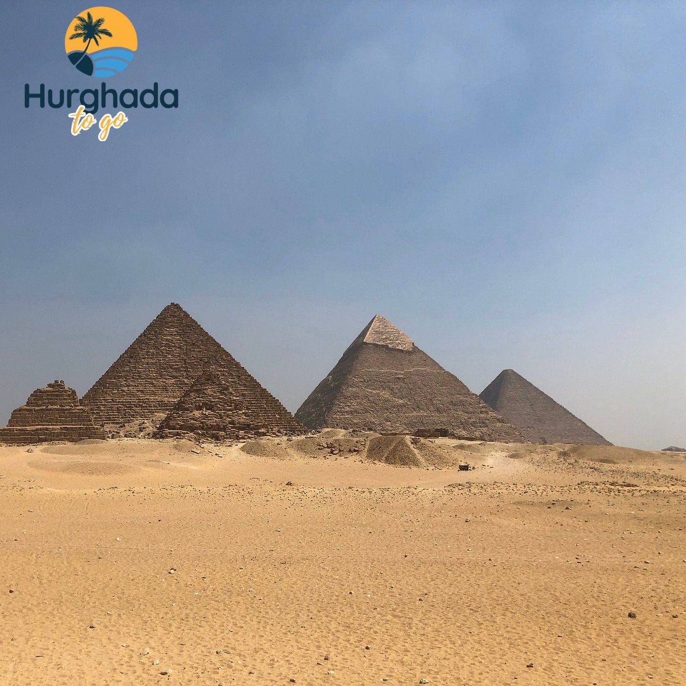 Best Day trip to Giza Pyramids and Sphinx from Hurghada 2026 Arrival at Giza Plateau – First Glimpse of the Pyramids